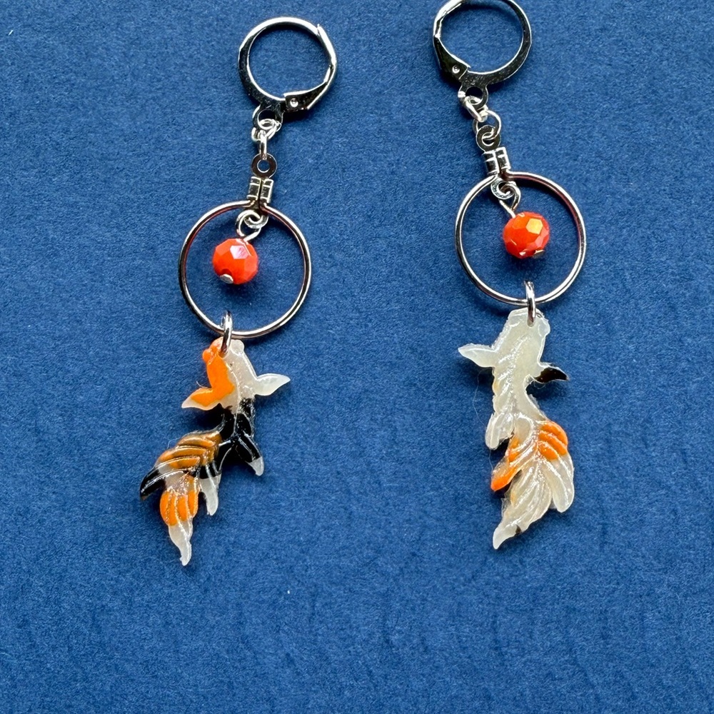 Fish Design Keychain Set with Orange and Black Accents